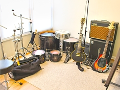 One of the many times the practice space is just a pile of gear. Not just any pile of gear, though.