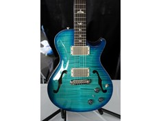 Beautiful blue finish on this PRS Guitars guitar. Check out the inlays too