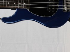 This bass has a gorgeous body shape, finish and you gotta love the MM oval pick guard.