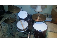 Kit as of April 2014:

Upgraded drum heads, cymbals, high-hat stand, snare stand and bass pedal.